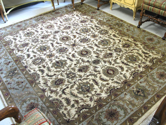 Appraisal: HAND KNOTTED ORIENTAL CARPET Indo-Persian having an overall floral decorated