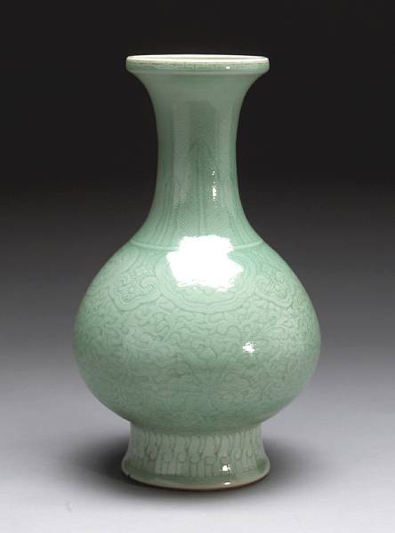 Appraisal: A celadon glazed porcelain vase with incised decoration Republic Period