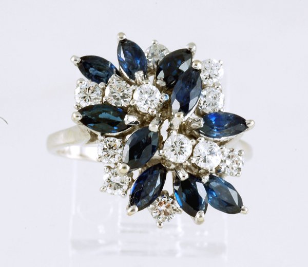 Appraisal: White gold ring stamped K Ten Marquise cut blue sapphires