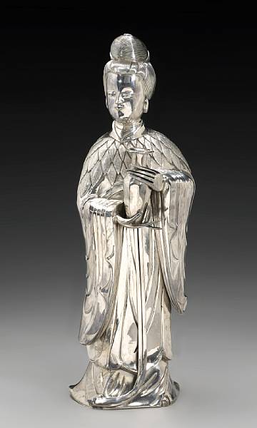 Appraisal: A hollow chased silver figure of a female immortal Late