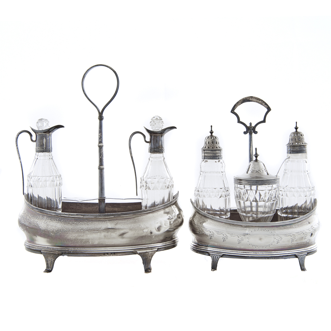 Appraisal: A Lot of George III sterling cruet caddies both with