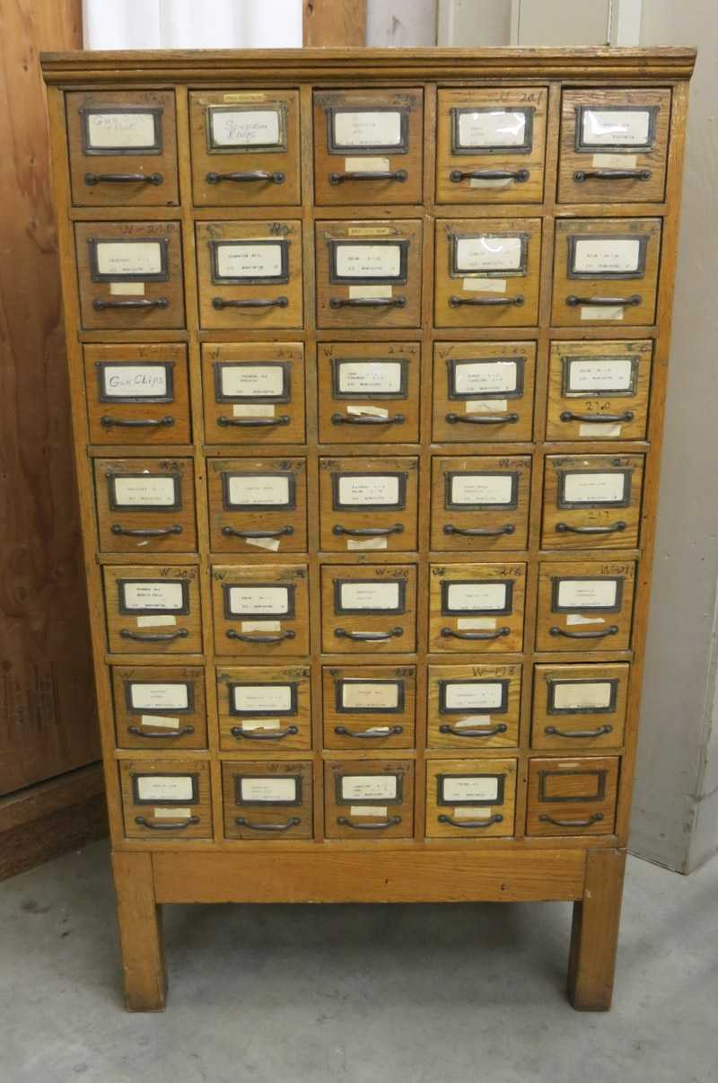 Appraisal: AN OAK CARD FILE CHEST ON STAND American c featuring