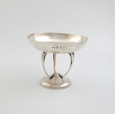 Appraisal: An Edwardian Scottish cup on a domed foot with three