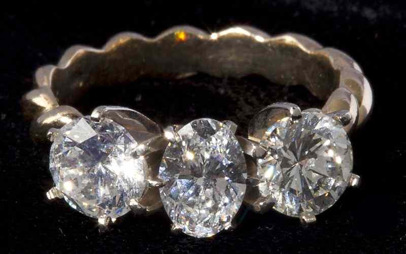 Appraisal: Three Stone Diamond Ringconsisting of stones the center diamond of