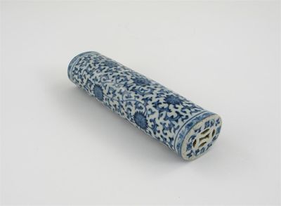 Appraisal: A Chinese blue and white hand warmer the oval section