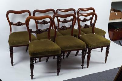 Appraisal: A set of seven Victorian buckle back dining chairs with