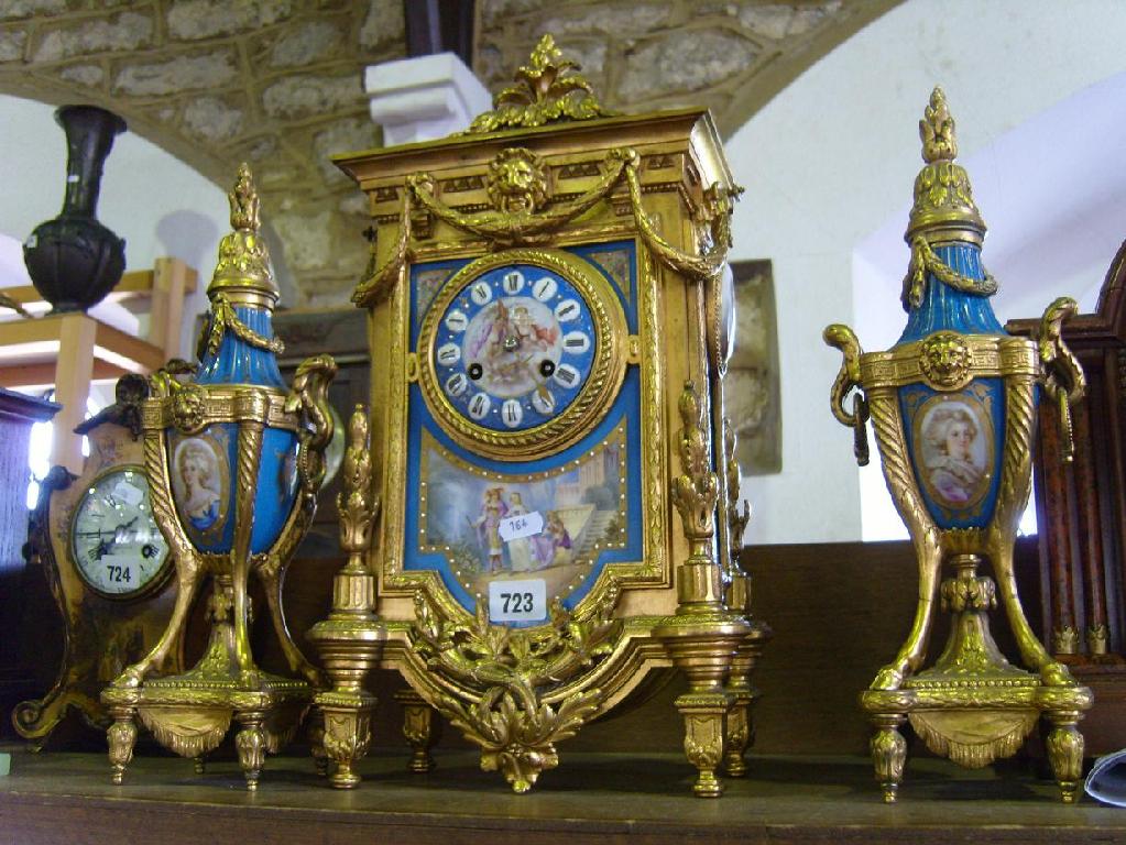 Appraisal: A mid th century gilt brass clock garniture the case