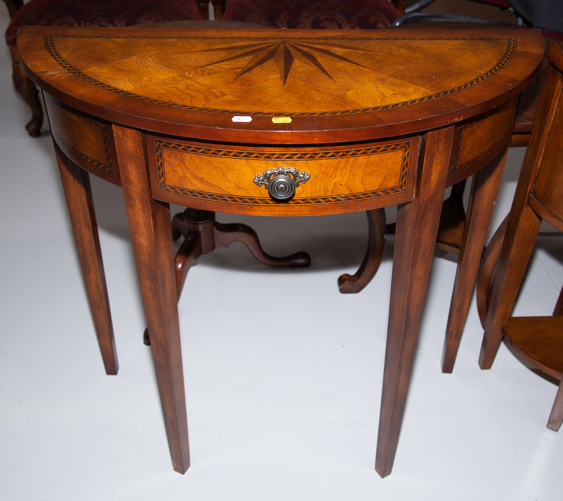 Appraisal: DEMILUNE HALL TABLE Modern with a single drawer approximately in