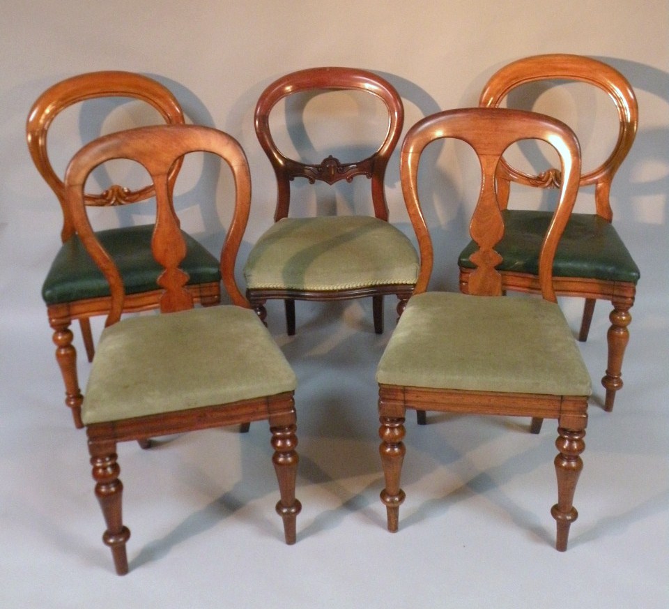 Appraisal: A harlequin set of five Victorian mahogany balloon back dining