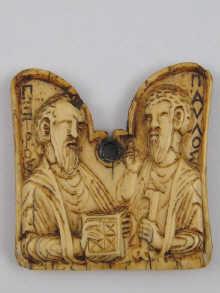 Appraisal: An ivory pendant ikon of saints Peter and Paul in