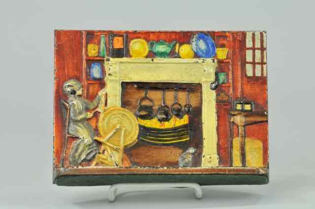 Appraisal: FIREPLACE WITH LADY SPINNING DOORSTOP Embossed ''Eastern Specialty Co ''