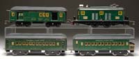 Appraisal: AMERICAN FLYER STANDARD GAUGE ELECTRIC LOCOMOTIVE WITH THREE MATCHING CARS