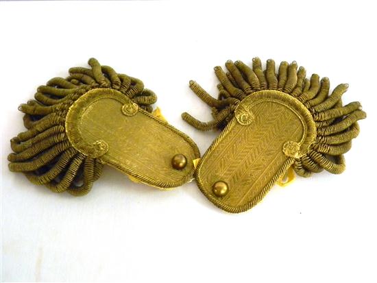 Appraisal: Pair of late th century epaulettes fashioned with brass sequins