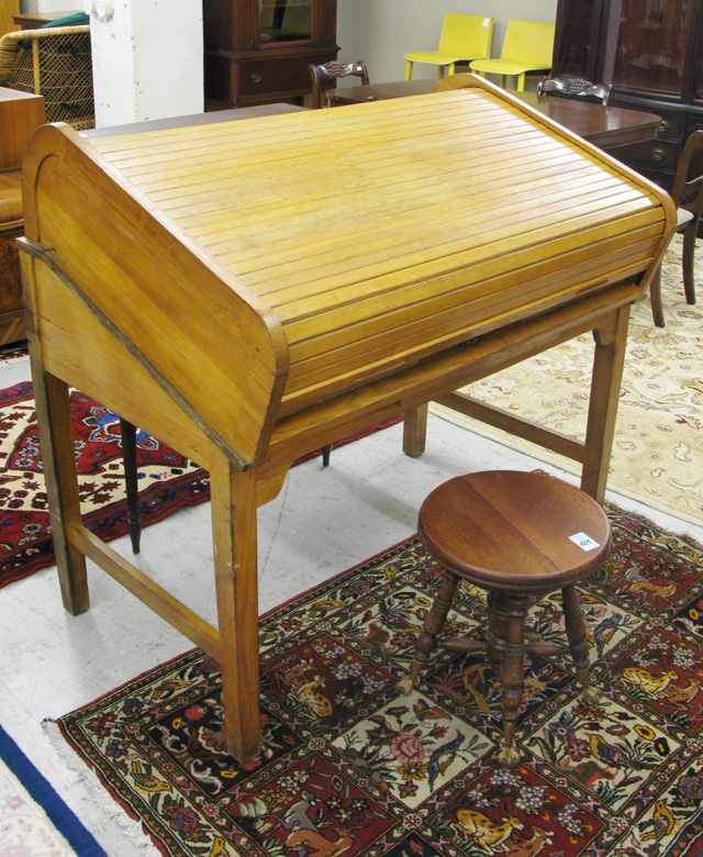 Appraisal: AN UNUSUAL OAK ROLL-TOP DRAFTING TABLE Buchan Loose Leaf Records