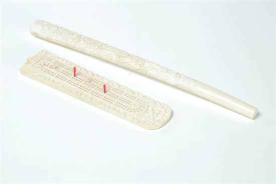 Appraisal: TWO IVORY ITEMS Asian early th century Cribbage board with