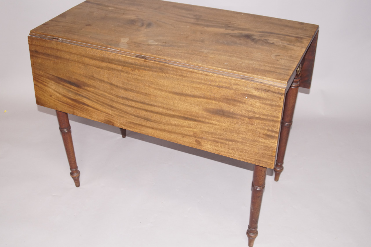 Appraisal: An early thC mahogany Pembroke table with ebony lined inlay