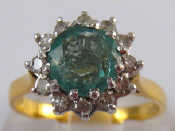 Appraisal: An carat gold emerald and diamond ring emerald approx mm