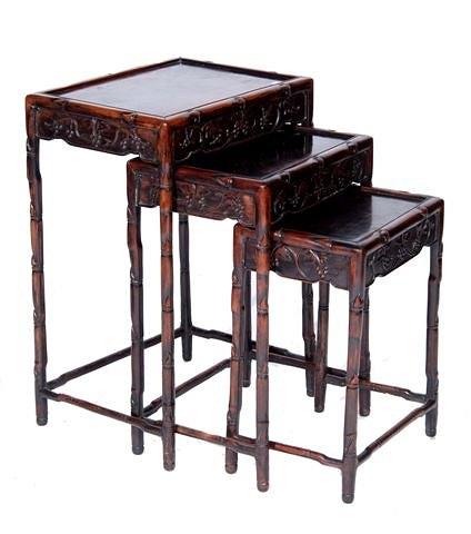 Appraisal: A NEST OF THREE CHINESE HARDWOOD TABLES with carved bamboo