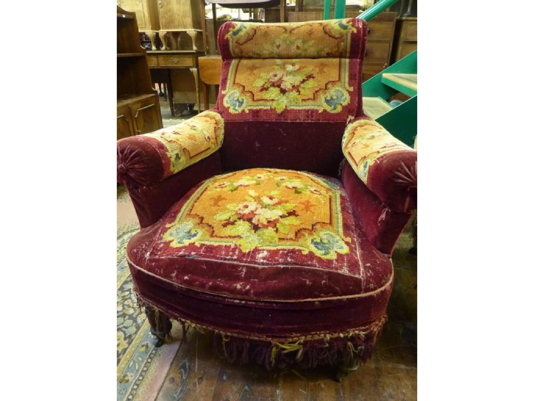 Appraisal: A pair of substantial Victorian armchairs with scrolled arms and