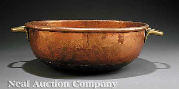 Appraisal: An Antique English Copper Cauldron two brass loop handles height