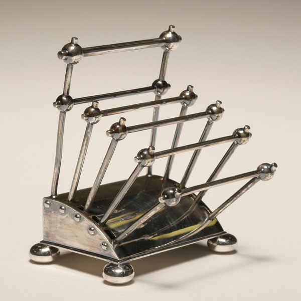 Appraisal: Christopher Dresser for Hukin Heath toast rack silver plated footed