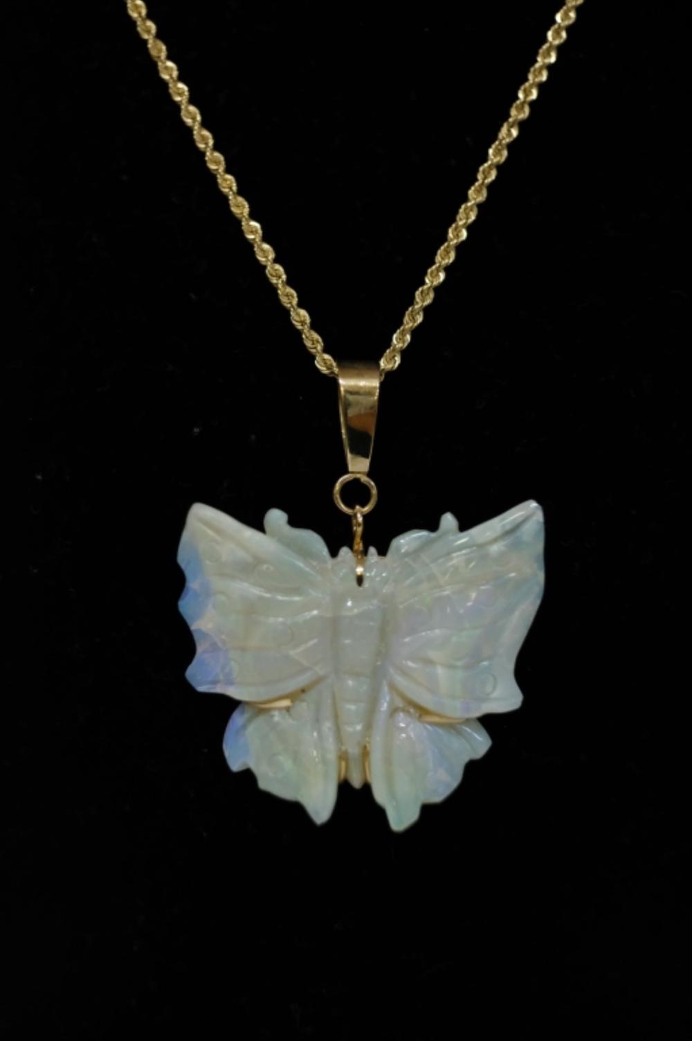 Appraisal: CT WHITE FIRE OPAL BUTTERFLY PENDANTCarved approx carat butterfly white