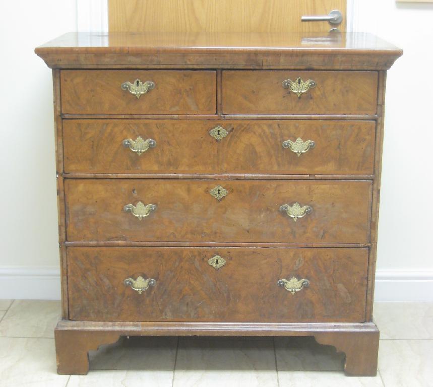 Appraisal: An antique walnut Chest of two short and three long