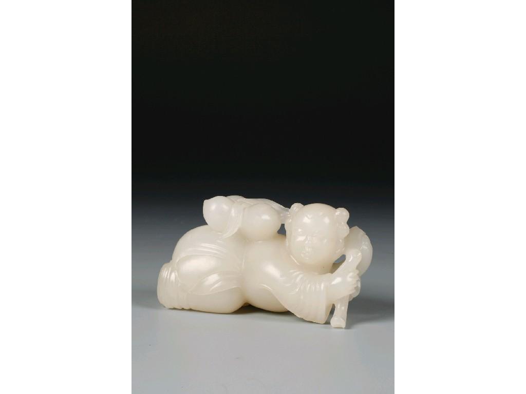 Appraisal: A CHINESE WHITE JADE FIGURE of a boy laying on