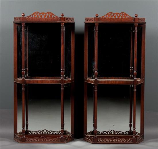 Appraisal: Pair of Georgian style carved mahogany wall shelves th century