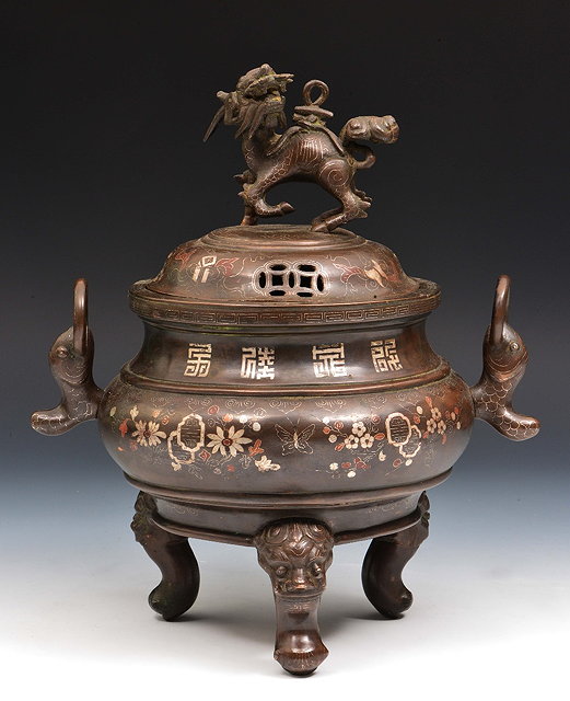 Appraisal: A Chinese bronze and inlaid censer and cover th Centurywith