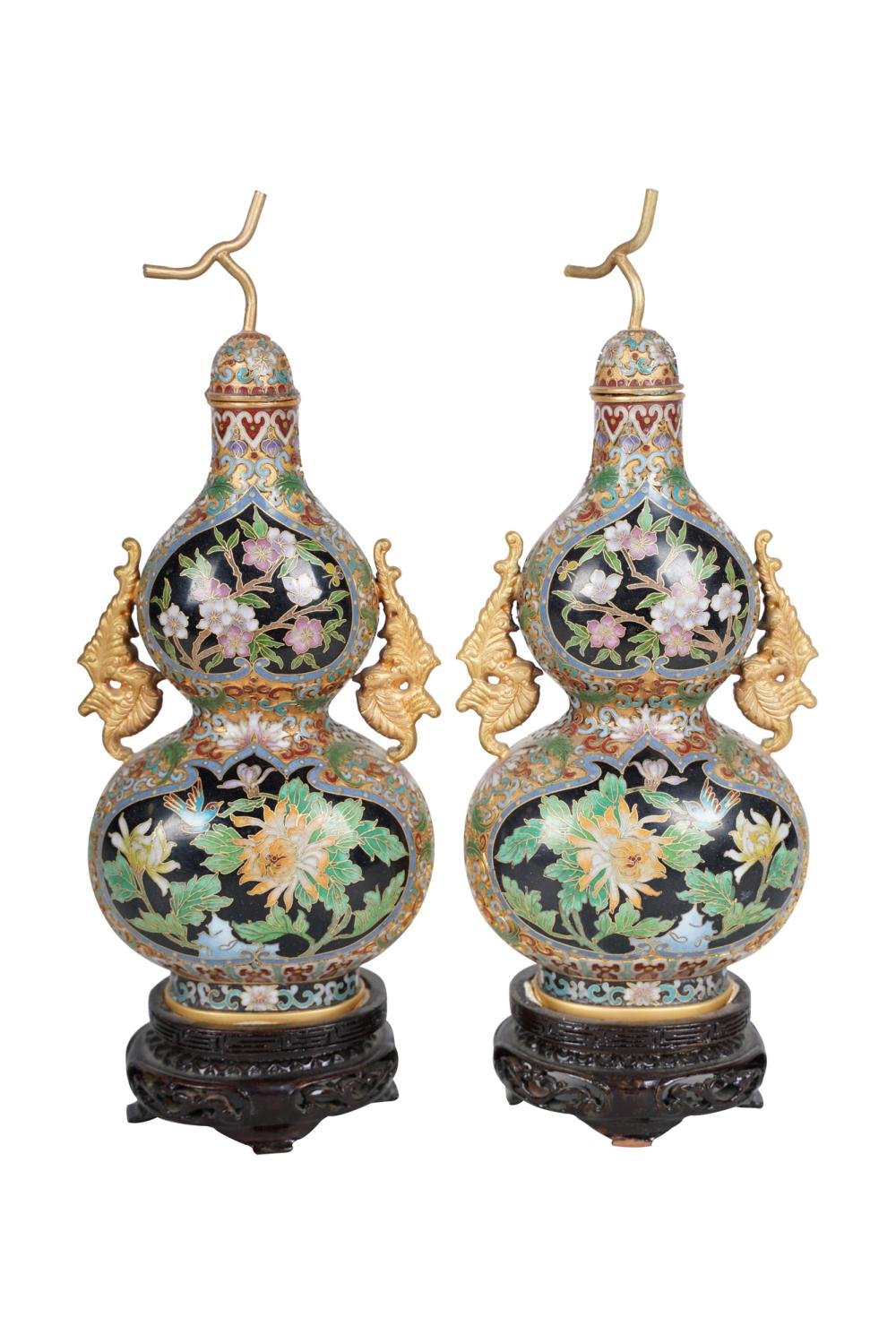 Appraisal: PAIR OF CLOISONNE COVERED GORD VASESresting on wood bases Condition