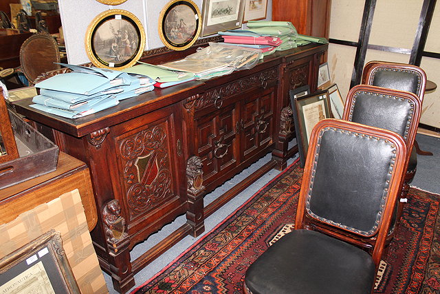 Appraisal: A LARGE LATE TH CENTURY NORTHERN EUROPEAN OAK BREAKFRONT SIDEBOARD