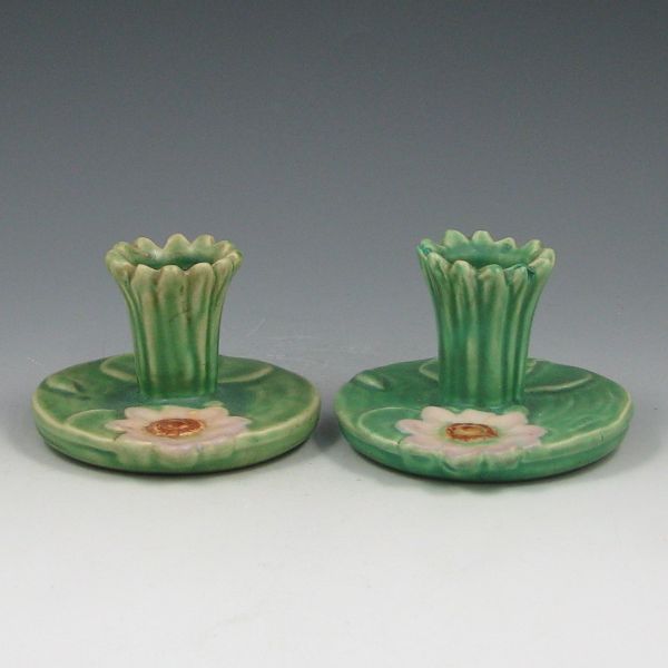 Appraisal: Pair of Weller Ardsley candleholders Marked with Weller Pottery kiln