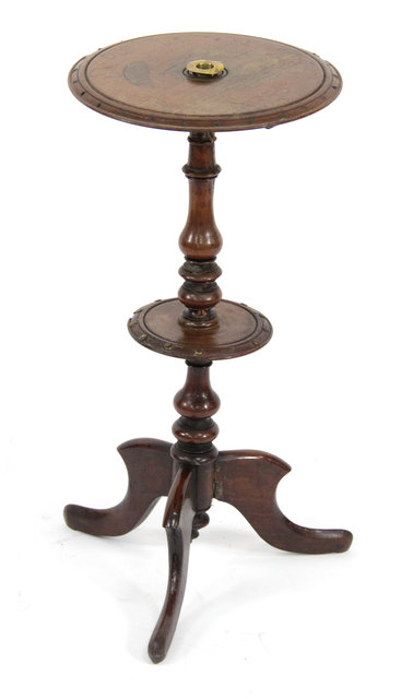 Appraisal: A Victorian walnut occasional table with tripod base