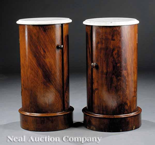 Appraisal: A Near Pair of Louis Philippe Mahogany Cylinder Commodes mid-