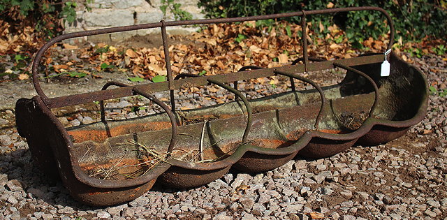 Appraisal: AN ANTIQUE CAST IRON TEN SECTION PIGLET FEEDING TROUGH cm