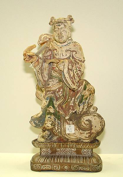 Appraisal: A pottery figure of a Daoist Immortal Portrayed as a