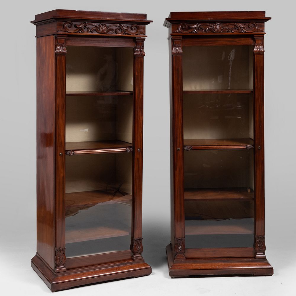 Appraisal: Pair of Regency Mahogany and Glazed Cabinets Each fitted with