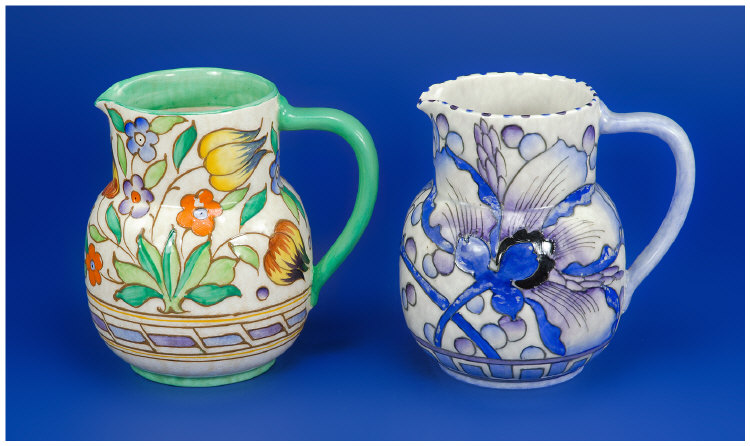 Appraisal: Bursley Ware Charlotte Rhead Jugs in total Multi- Coloured Plant