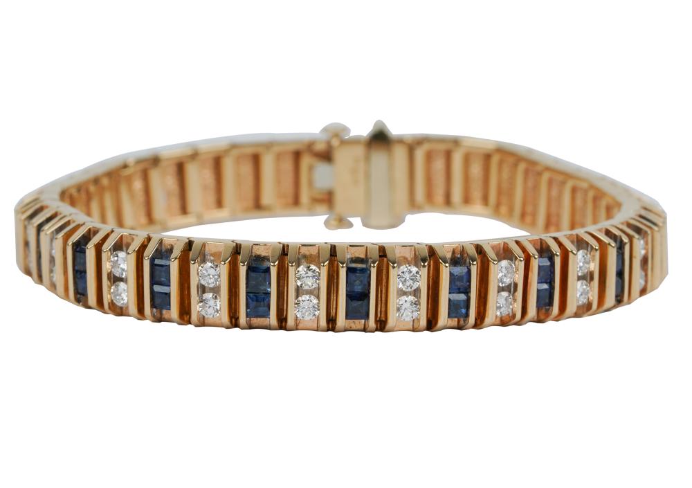 Appraisal: KARAT YELLOW GOLD DIAMOND SAPPHIRE BRACELETcontaining square step cut sapphires