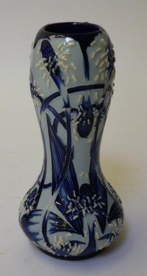 Appraisal: A MOORCROFT POTTERY VASE of baluster form with bombe neck