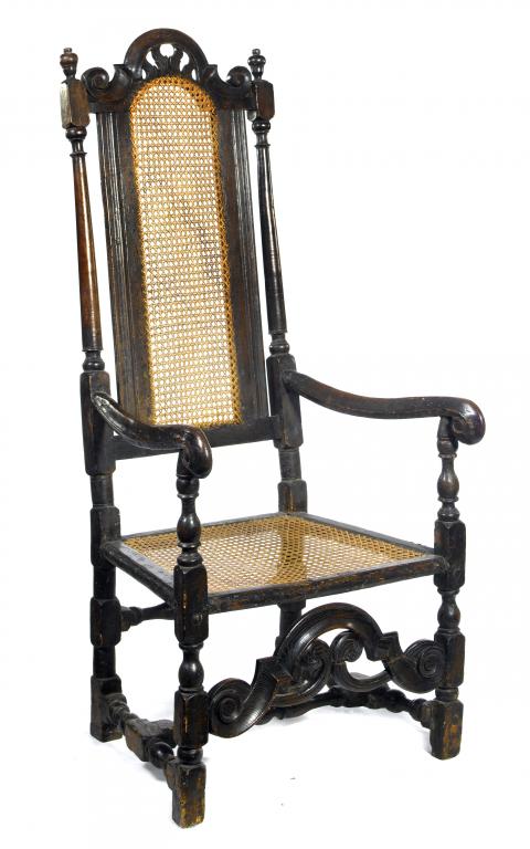 Appraisal: A WILLIAM III BEECH ARMCHAIR with caned splat flanked by