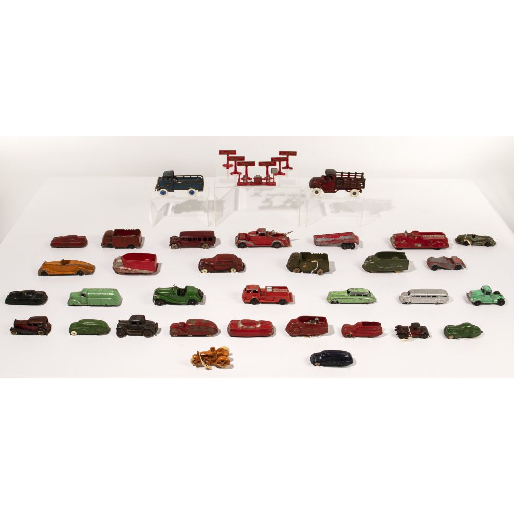 Appraisal: CAST IRON AND RUBBER TOY CAR ASSORTMENT items including metal