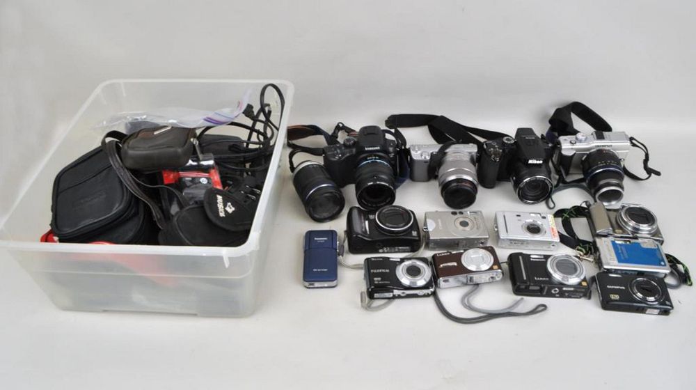 Appraisal: Large Group of Digital Cameras including cameras from Nikon Olympus