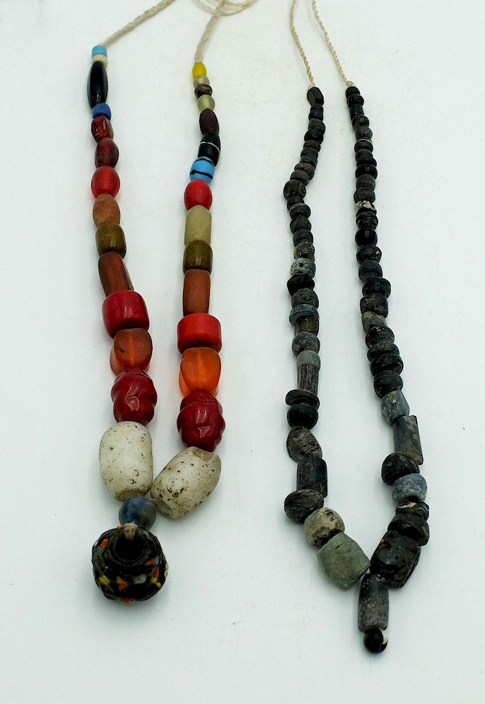 Appraisal: Strands of Ancient Beads Indus Valley Two strands of ancient