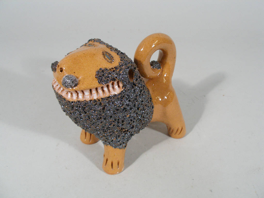 Appraisal: NC Folk Art Billy Ray Hussey Lion clear orange glaze