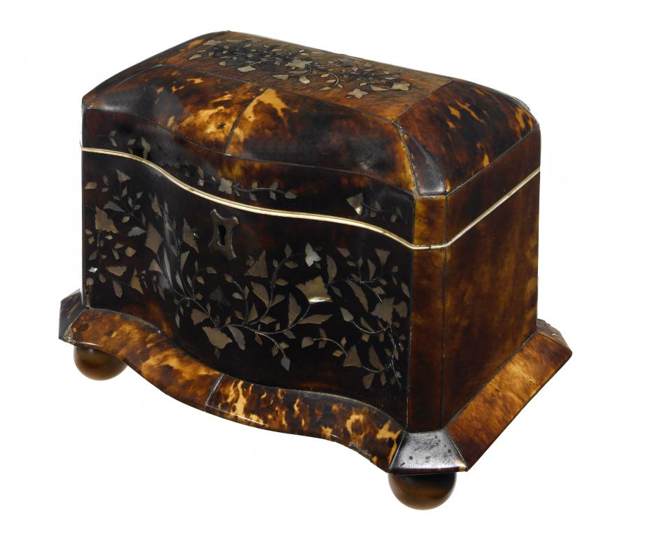 Appraisal: A VICTORIAN TORTOISESHELL TEA CADDY the domed lid and serpentine