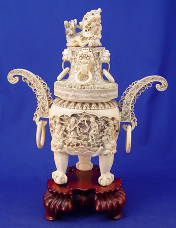 Appraisal: CHINESE CARVED IVORY COVERED URN Dragon motif lid with rings