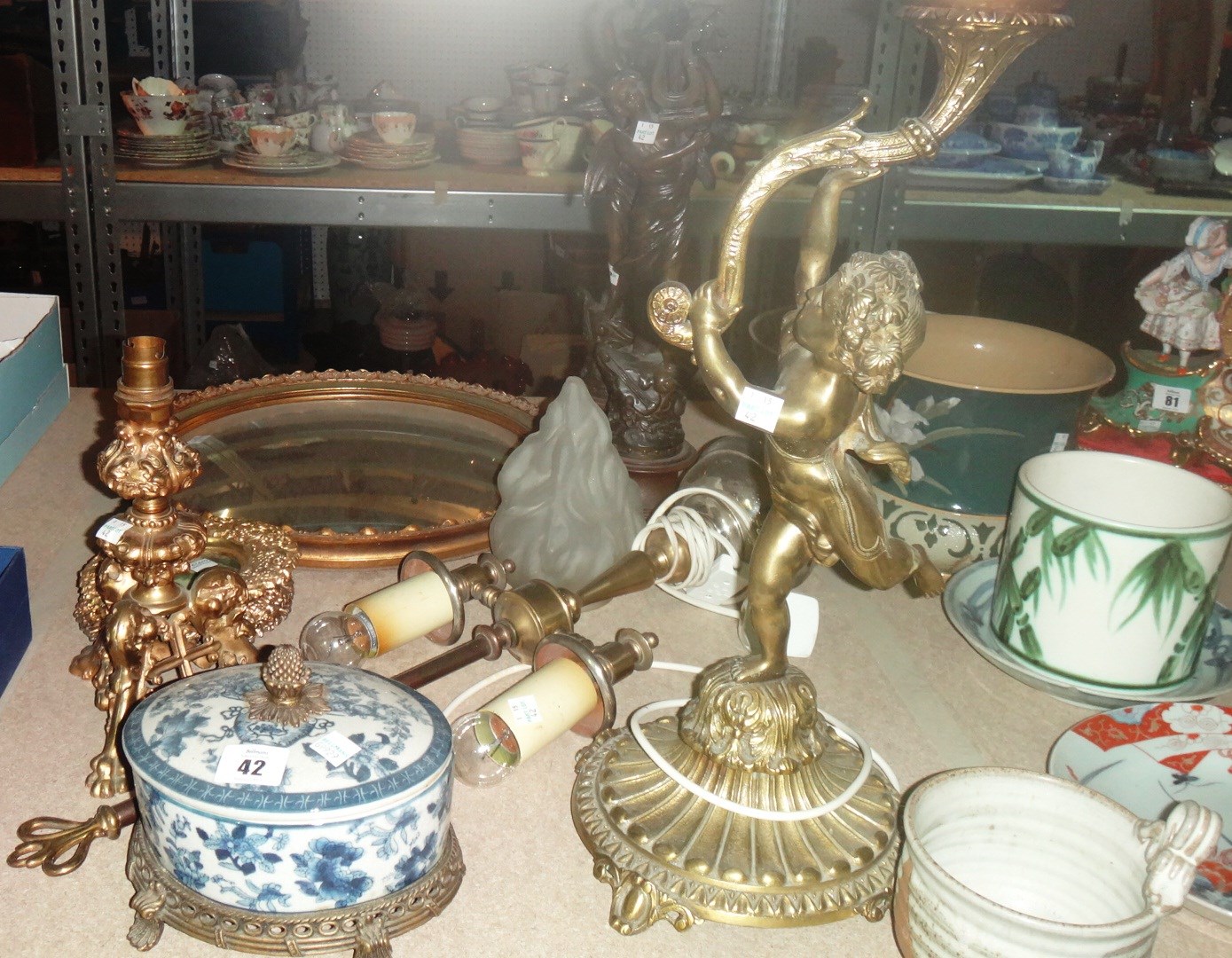 Appraisal: A group of metalware including spelter figures lamps and sundry