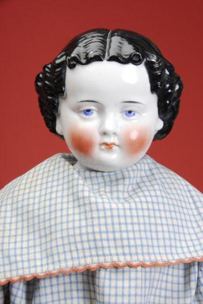 Appraisal: China Lady with Gingham Dress Germany ca glazed porcelain shoulder